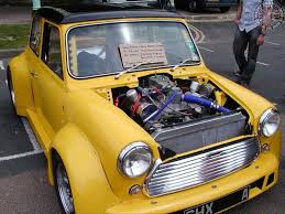 Yes Folks That Really Is A Small Block Chevy Squeezed In To This Next Widearchedwednesday Lil Beasty Awesome Or What Mini Cars Classic Mini Mini Cooper