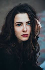 White fashion woman, brown beautiful long hair and eyes in black vest, blue jeans. 110 Black Haired Beauties Ideas Dark Hair Hair Pale Skin Black Hair Blue Eyes