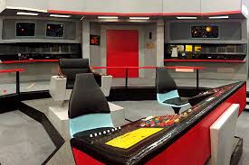 The four picard photos show the interior of captain rios' ship, the la sirena, raffi's trailer at vasquez rocks, the interior of a borg cube, and admiral picard's study at chateau picard. Star Trek Original Star Trek Star Trek Bridge