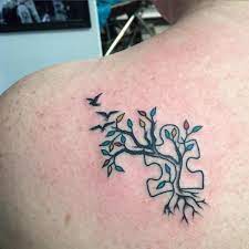 Karen is a gifted artist and designs autism puzzle piece tattoos. Autism Tree Tattoo Design Autism Tattoos Tattoo Styles Awareness Tattoo