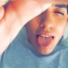 The snake eyes tongue piercing consists of entrance and exit holes at the very tip of the tongue. Snake Eyes Piercing 50 Ideas Pain Level Healing Time Cost Experience Piercee