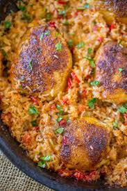 Melt 2 tablespoons butter in a large skillet with high sides. Restaurant Style Chicken And Rice A Delicious Chicken Recipe Inspired By Arroz Con Pollo Chicken Thights Recipes Mexican Chicken And Rice Can Chicken Recipes