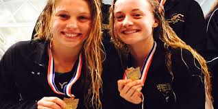 Quite a splash: Lex girls give school its first district title