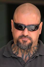 Former Finks enforcer to face charges in Queensland