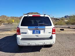 Image result for White Suede 2010 Escape