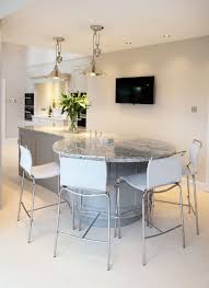 The recommended width for a kitchen island seating six is about 42 inches. Beautiful Island With Circular Seating Section Kitchen Island With Seating Kitchen Seating Granite Kitchen Table