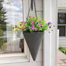 The white background of the wall gives the flowers more chance to bloom. Buy Ageomet 9pcs Artificial Flowers Outdoor Uv Resistant Shrubs Plants Outdoor Fake Flowers Plastic Silk Flowers For Outside Garden Window Box Indoor Hanging Planter Decor Online In Vietnam B07qft66tr