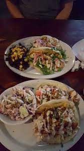 The tastes here are incredible if you are adventurous enough to go tacos: Grilled Lemon Shrimp Tacos With Black Beans And Rice Bbq Mahi Tacos With Slaw Picture Of Cabo Fish Taco Baja Seagrill Charlotte Tripadvisor