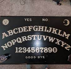 Hand made coffee table / ouija board. I Painted My Coffee Table In 2021 Ouija Table Ouija Board Table Diy Ouija Board