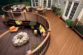 Installing fireplaces and/or fire pits with trex decking: Trex Transcend Decking Railing Tree House Vintage Lantern Curve Fire Pit Couch Trex