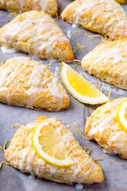 Place all dry ingredients in a mixing bowl, or in the bowl of an electric mixer fitted with the paddle attachment. Lemon Scones With Lemon Glaze Baker Bettie