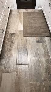 Provides The Look Of Wood With The Resiliency Of Porcelain Tile Perfect For Kitchen Bathroom And Entry Wood Look Tile Floor Wood Tile Bathroom House Flooring