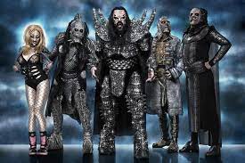 She claims to be a big melodic metal fan, and her favorite bands include behemoth and children of bodom. What Do Lordi Look Like Without Costumes