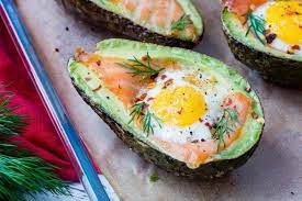 Salmon Egg Baked Avocados For Balanced Hormones Glowing Skin Recipe Baked Avocado Avocado Egg Bake Avocado Baking Recipes