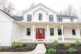 Maybe you would like to learn more about one of these? Black Windows White Board And Batten Siding Red Front Door Columbia Farmhouse By Wayne Homes Red House Exterior Red Door House White House Black Shutters
