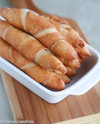 From cornmeal coated catfish fingers to baked red snapper, there is something here for everyone! African Fish Roll Fish Pie Africa Food African Cooking African Food