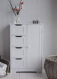 Freestanding furniture piece, which conveniently fits anywhere and adds easy storage for files, knives, forks, roll paper, and other daily necessities. Freestanding Bathroom Cabinet White Bathroom Storage Freestanding Bathroom Cabinet White Bathroom Storage Small Bathroom Furniture