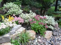 When many people think about landscaping they focus only on flowers. Landscaping Ideas Rocks And Bricks And Stones Oh My
