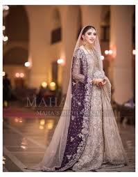 Small traditions like doodh pilai or joota chupai also take place to add fun to the glorious day. Pretty Dull Gold Reception Lehenga And A Contrast Dupatta Purple Pakistani Wedding Dress In 2021 Bridal Dresses Pakistan Indian Bridal Dress Desi Wedding Dresses