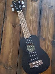 The base unit come with a shelf included, the wall units come with two shelves as standard. Black Satin Mahogany Soprano Kala Brand Music Co