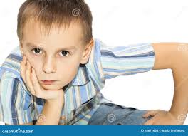 The Boy Looked Intently into the Distance. Stock Photo