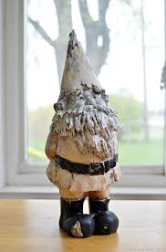 Hi there, use enamel paint or concrete paint or as i did, use up some of the gloss paint i had laying around. Repainted Garden Gnome Mad In Crafts