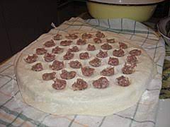 It's then served with red wine vinegar, black pepper, and melted butter. Pelmeni Wikipedia