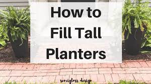 Tall planters are perfect for adding a splash of green in a corner of wonder how to keep tall planters from blowing over? How To Fill Tall Planters Easily Without Making Them Heavy