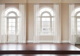 How To Dress Awkward Windows Where To Shop For Readymade Options Emily Henderson Arched Window Treatments Family Rooms Curtains For Arched Windows Arched Window Treatments