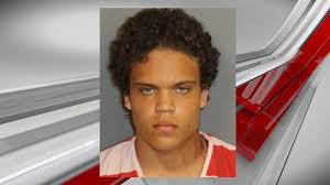 Man shot by security guard charged with assault after fight near parking  garage