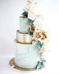 Moody Winter Neutrals Wedding Cake Iced With Our Signature Rolled Chocolate Decorated With Our Own Wedding Cakes With Flowers Winter Cake Wedding Cake Table