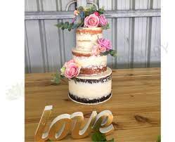 Wedding cakes with fresh flowers are such a beauteous sight. Cake Decorated With Artificial Flowers And Succulents Cake Topper Perth Wa Australia Artistic Greenery