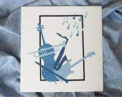 Type number color dmc 310 black dmc b5200 snow white Music Cross Stitch Pattern Silhouette Musical Instruments Cello Trumpet Saxophone Electric Guitar Clarinet Notes Modern Chart