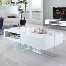 The rectangular table features a ball bearing swivel mechanism to allow the top to spin 360 degrees, transforming the 35.5 table to 47 in length. Living Room Wooden White High Gloss Mdf Drawer Glass Coffee Table Buy Glass Coffee Table Coffee Table Mdf Drawer Glass Coffee Table Product On Alibaba Com