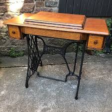 Unlike modern plastic machines, the antique sewing machines were as much designed for heavy use as for their beauty. Vintage Singer Sewing Table Treasure Trove Ltd Antique Shop Castlebridge Wexford Antiques Vintage Furniture Collectibles