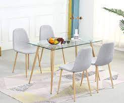 Glass tabletops can scratch or chip easily, though, and will likely have an abundance of fingerprints. Buy Dining Table Set For 4 Modern 5 Pieces Dining Room Set Rectangle Tempered Glass Table And 4 Grey Fabric Dining Chairs Kitchen Table And Chairs For Dining Room And