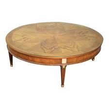 You use them to gather around with friends and family, set down your drinks, put up your feet, and, if you're like me, eat here's where choosing a round coffee table will save the day, helping you to maximize every square inch of your small space by giving you more. Large Round Baker French Louis Xvi Brass Mounted Coffee Table With Glass Chairish