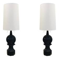 If your home is more contemporary or modern, look for unexpected profile and pared down finishes in a buffet lamp set. Currey Co Modern Large Steeple Buffet Lamps Pair Chairish