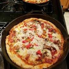 Deep Dish Cast Iron Pizza Recipe A Buttery Thick And Chewy Pizza Dough That Is Baked In A Cast I Cast Iron Pizza Cast Iron Cooking Cast Iron Skillet Pizza