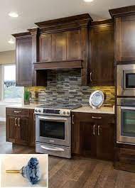 These are the most common, and they work well, bringing out the natural beauty of oak wood. Dark Light Oak Maple Cherry Cabinetry And Are Wood Kitchen Cabinets Back In Style Chec Cherry Wood Kitchen Cabinets Kitchen Remodel Wood Kitchen Cabinets