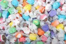 Background Of Salt Water Taffy In Various Flavors And Colors