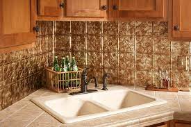 Faux metal tincopper steel wed add a faux tin pvc backsplash roll tile home it is dimensionally embossed peel and panels our faux metal tile colors patterns available in a faux stainless steel brass. The Best Kitchen Backsplash Materials