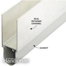Slide A Section Of Retainer And Gasket Onto The Bottom Edge Of The Garage Door Tilt It Until The Rubber Gasket To Garage Doors Garage Decor Garage Floor Paint