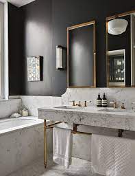 The floors of this bathroom are finished with marble tiles and accent the marble vanity. Pin By M M On Bathrooms Marble Bathroom Designs Bathroom Trends Bathroom Inspiration