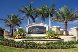 Natural landscaping abounds and is punctuated by stately pine, oak and palm trees. Marbella Lakes Naples Fl Marbella Lake House Styles