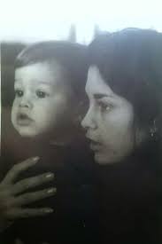 Can someone enhance this old picture of me and my son?