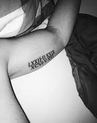Roman numeral tattoos have become so popular. Bicep Roman Numeral Tattoo Mens Roman Numeral Tattoo Numeral Tattoo Bicep Tattoo Men
