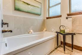 Free cad drawings of bathtubs in orthogonal projections: Built In Bathtub With Side Table For Necessary Essentials While Stock Photo Picture And Royalty Free Image Image 150574140