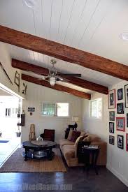 Vaulted Ceilings With Exposed Beams Faux Wood Workshop In 2020 Vaulted Ceiling Beams Ceiling Beams Living Room Wood Plank Ceiling