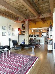 Lighting For Open Beam Ceilings The Exposed Beams And Bamboo Floors Complement The Sleek Interior Luxury Loft Lofts For Rent Interior Spaces